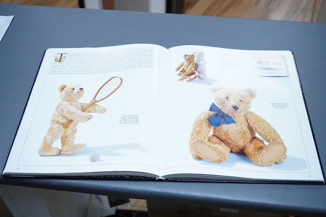 A Steiff artificial silk Teddy bear, (5650.2), jointed blonde body, stitched snout and glass eyes, button in ear, with related book and papers, bear 50cm